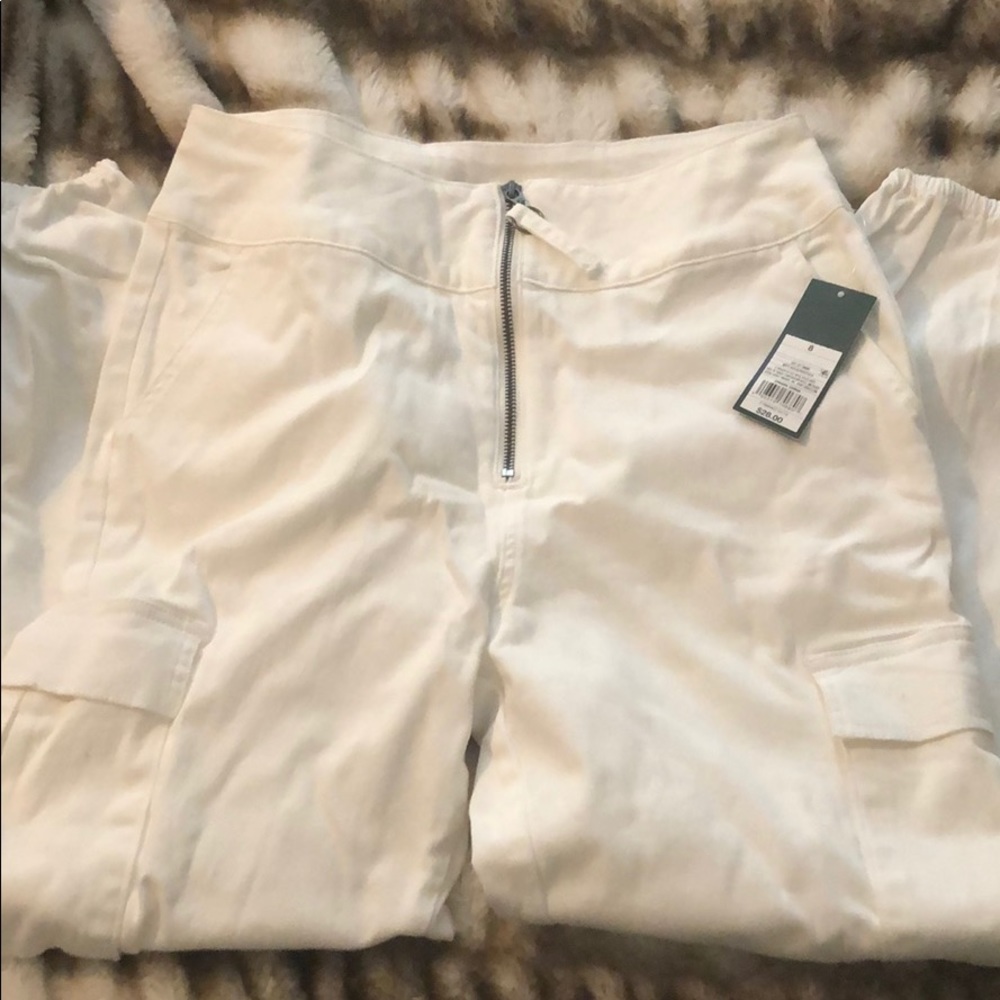 white cargo pants with tags on